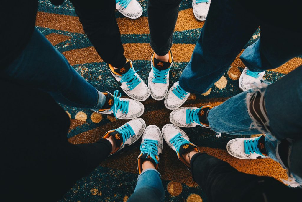A group of people standing in a circle
